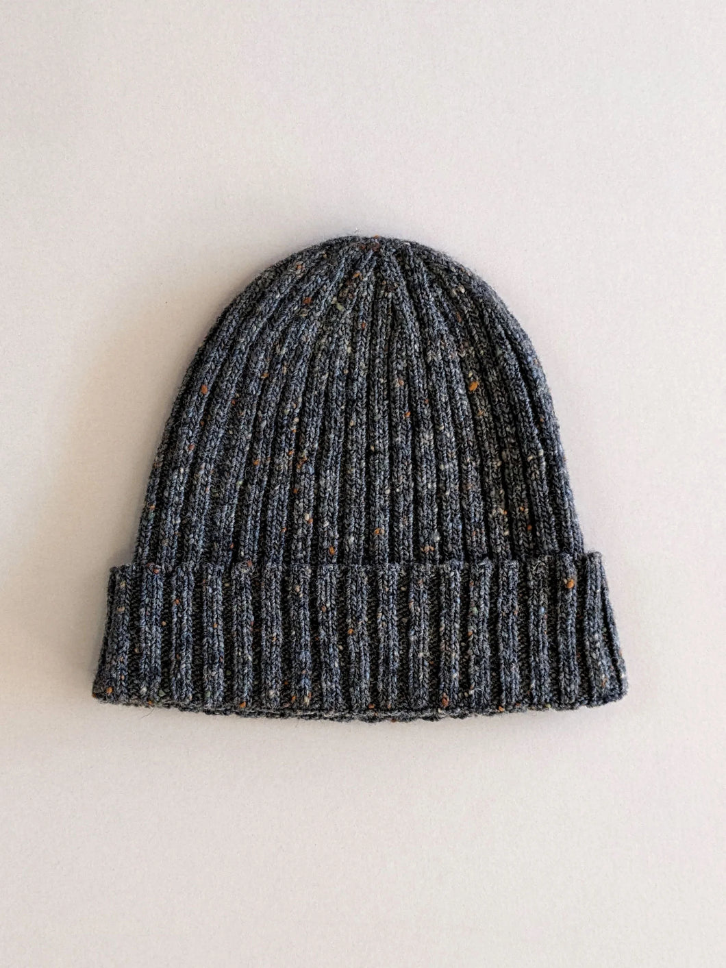 Rove Knitwear Donegal wool beanie in grey fleck. Cruelty Free + UK Made. Unisex + one size