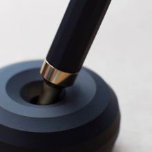 Load image into Gallery viewer, Paperweight and pen holder - solid aluminium with misty black finish - HMM