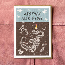 Load image into Gallery viewer, Aimee Mac Illustration - Another Year Older Dinosaur Birthday Card
