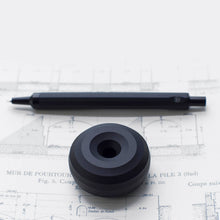 Load image into Gallery viewer, Paperweight and pen holder - solid aluminium with misty black finish - HMM
