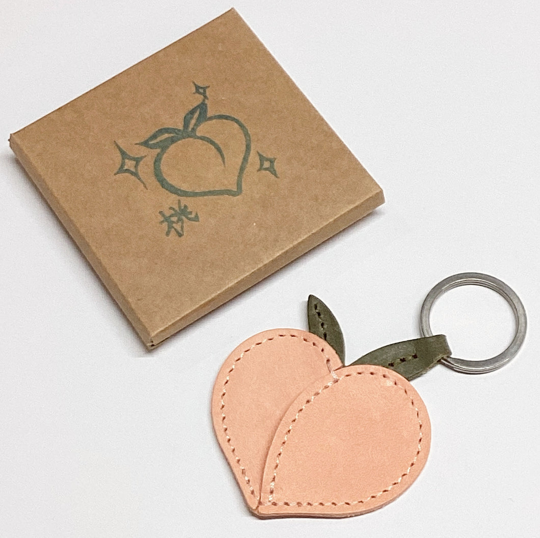 Handmade leather Peach keyring + token / coin holder by Herr PONG Berlin