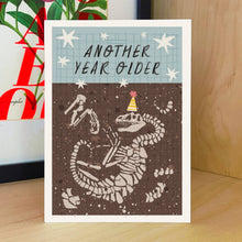 Load image into Gallery viewer, Aimee Mac Illustration - Another Year Older Dinosaur Birthday Card
