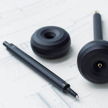 Load image into Gallery viewer, Paperweight and pen holder - solid aluminium with misty black finish - HMM
