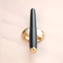 Load image into Gallery viewer, Tom&#39;s Studio - Solid Brass Pen Rest
