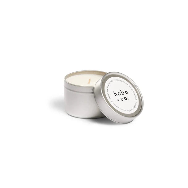 raspberry + peppercorn soy wax scented travel tin candle by hobo + co